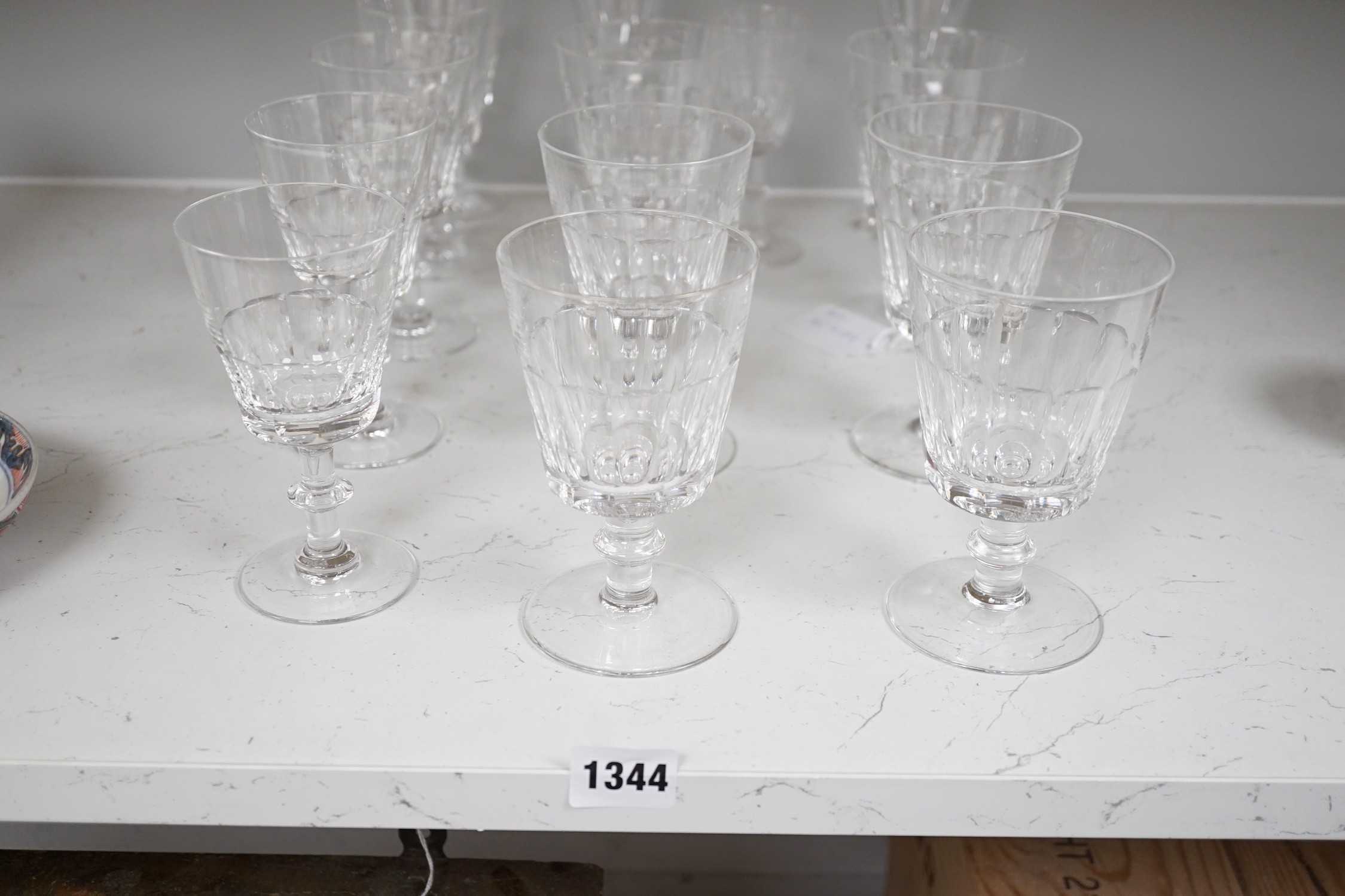 A set of nine cut drinking glasses, five similar glasses and three others